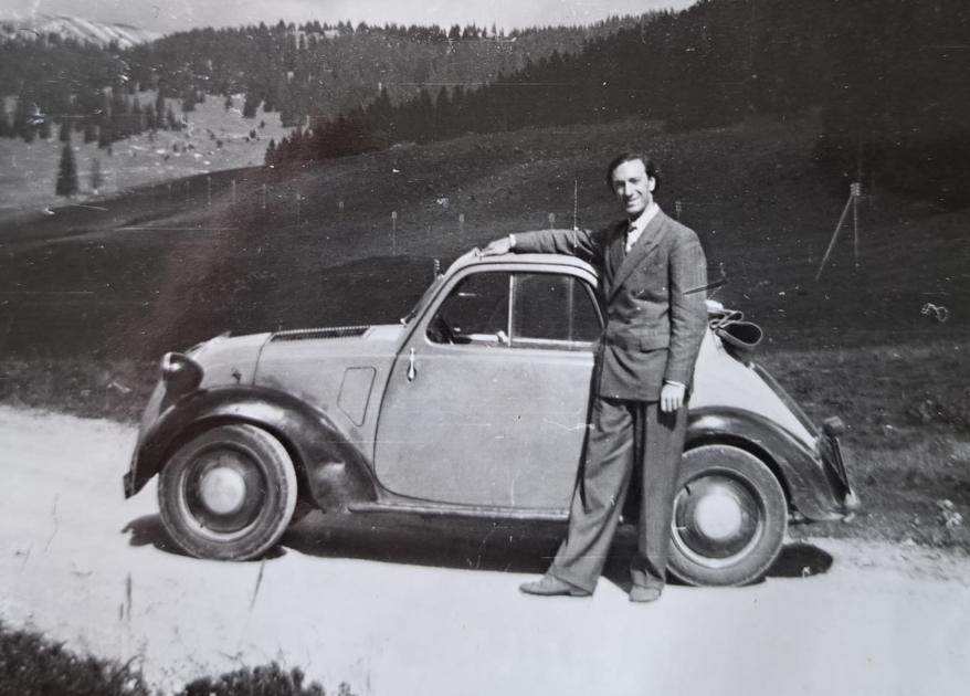 With his car Topolino
